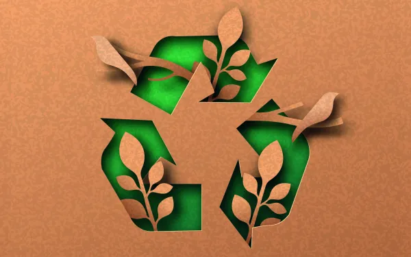 Recycling-Kreislauf-Pfeile mit Pflanzensprossen darin.